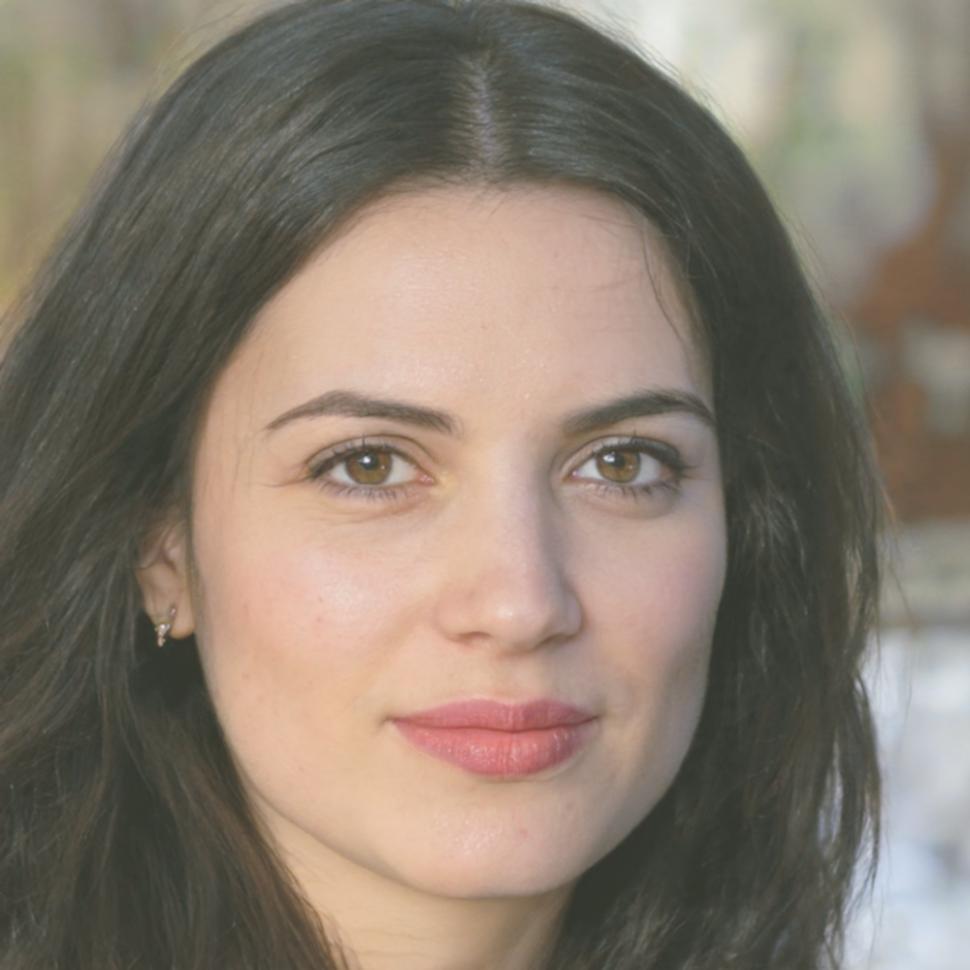 Portrait of Zinnia Greystone, Program Director